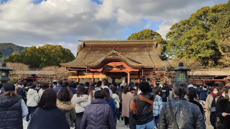 Visitors approaching the main hall of Dazaifu Tenmangu Shrine