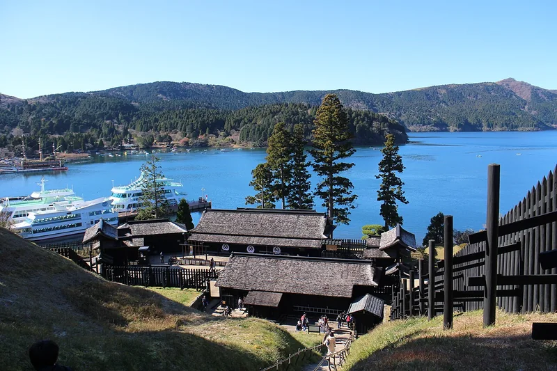 Reconstructed checkpoint buildings below the lookout at Hakone Sekisho beside Lake Ashi