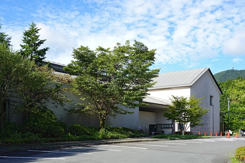 The exterior of Hakone Lalique Museum beneath a blue sky