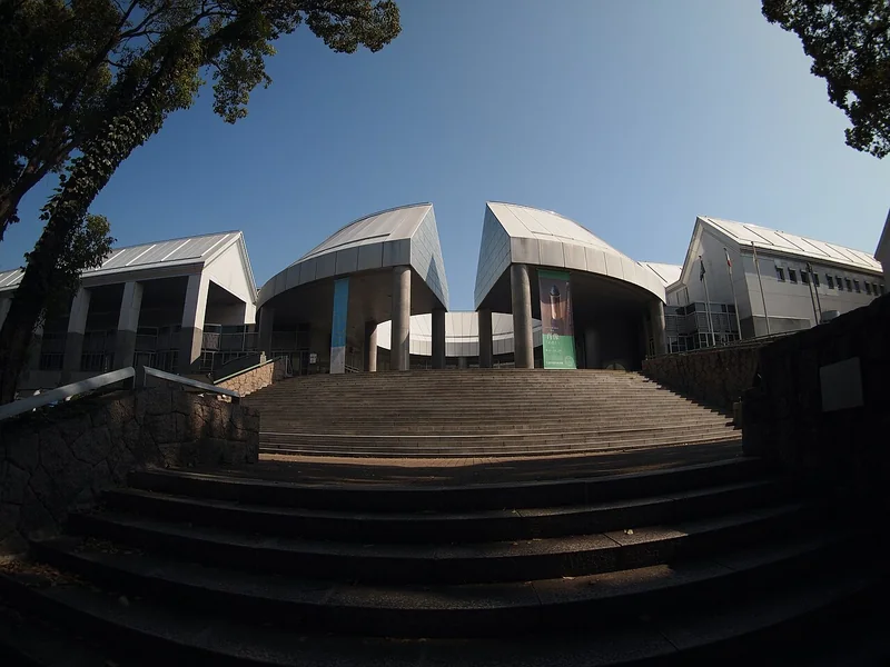 The geometric entrance and broad steps of Hiroshima City Museum of Contemporary Art