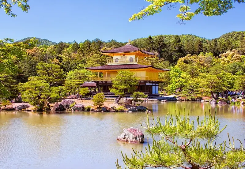 Kinkaku-ji's golden pavilion reflected in its pond