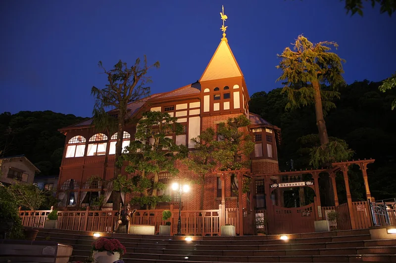 The Weathercock House illuminated on Kobe’s Kitano hillside