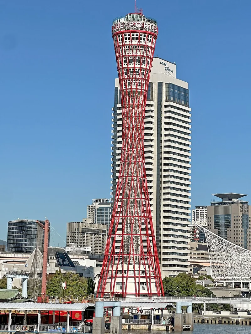 The red lattice of Kobe Port Tower, photographed after its 2024 reopening