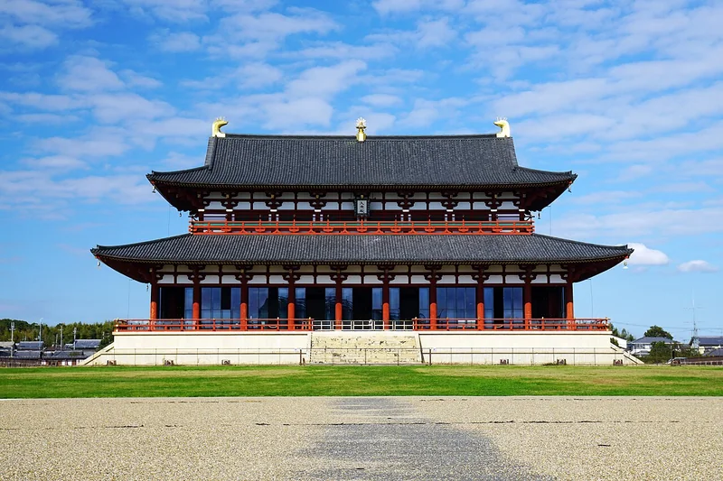 The reconstructed Great Audience Hall at the Heijo Palace site beneath a blue sky