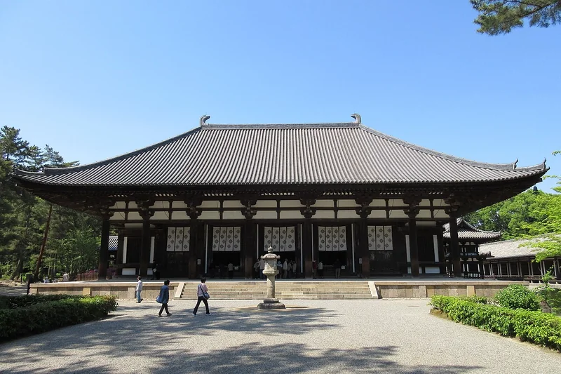 The broad tiled roof and timber columns of Toshodaiji Golden Hall