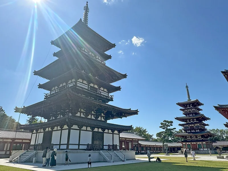 The west and east pagodas at Yakushiji beneath the afternoon sun