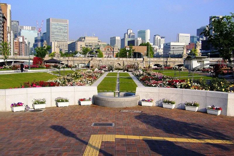 Formal flower beds and city views in Nakanoshima Park