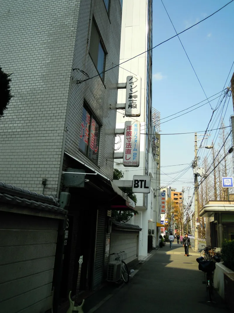A narrow shopping lane among the buildings of Nakazakicho