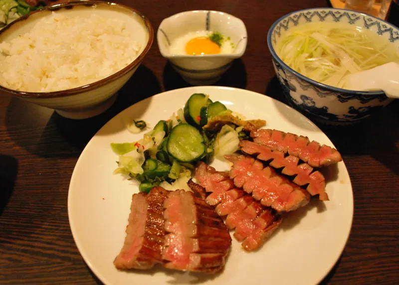 A gyutan set meal with grilled beef tongue, rice and soup