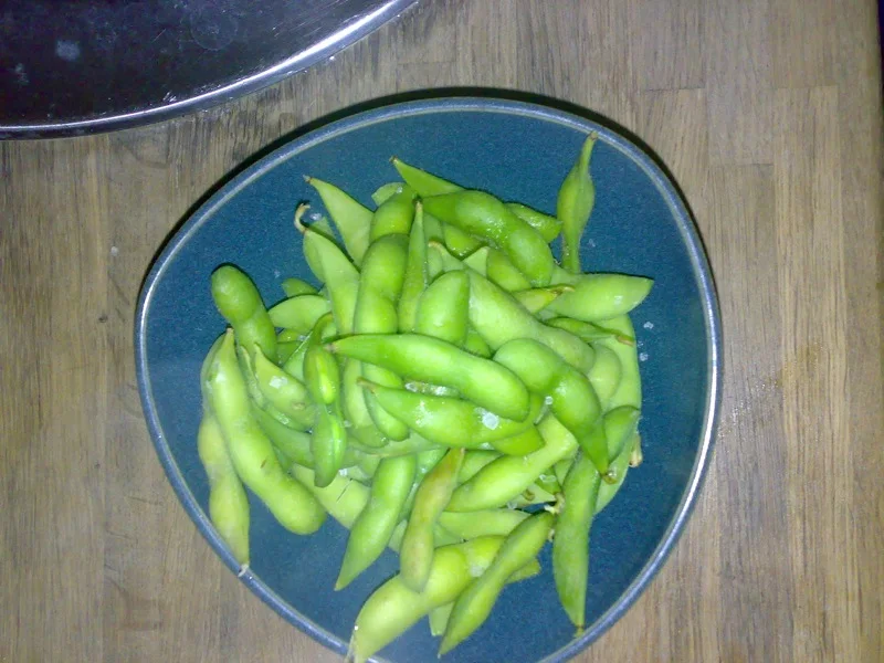 Edamame in their pods, ready to shell.