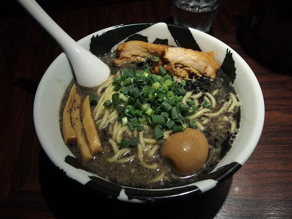A tonkotsu ramen bowl with a dark topping.
