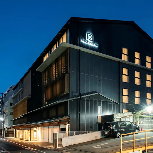 Prince Smart Inn Kyoto Sanjo illuminated at dusk