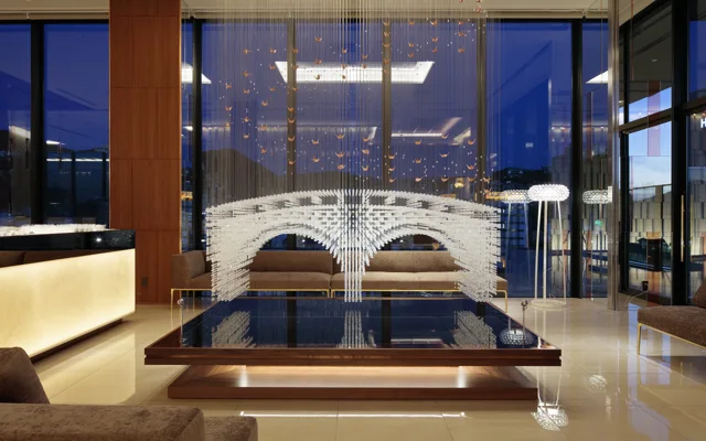 Reception and illuminated bridge-inspired feature at Candeo Hotels Nagasaki Shinchi Chinatown