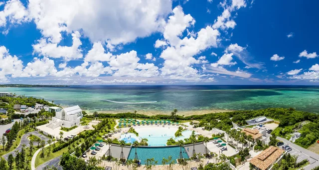 Resort gardens and pools overlooking Tiger Beach at Hotel Monterey Okinawa