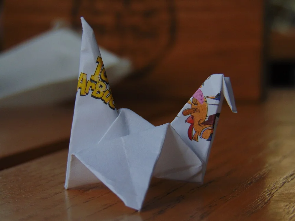 Folded paper cranes illustrating the use of origami paper