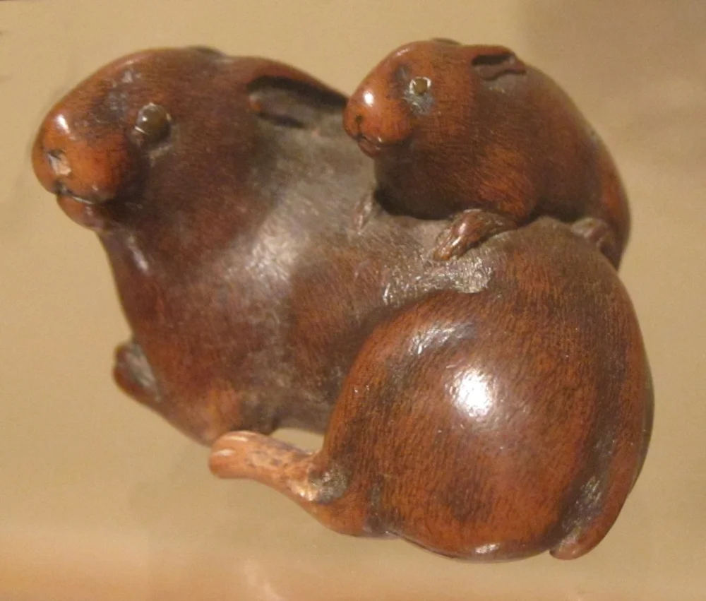 A historic wooden rabbit netsuke from a museum collection